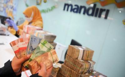 เตรียมพร้อมขั้นสุด! แบงก์ยักษ์ใหญ่ 'มันดิริ' ทุ่มเงินสดมหาศาล 44 ล้านล้านรูเปียห์ รับมือเทศกาลตรุษอิดิลฟิตรี 2026 พร้อมแผนเด็ดสำหรับยุคดิจิทัล!